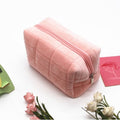 Neceser de maquillaje rosa a cuadros